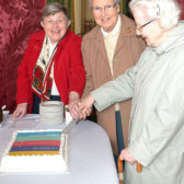 Sisters-cutting-cake