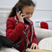 Student talking on the telephone.