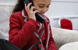 Student talking on the telephone.
