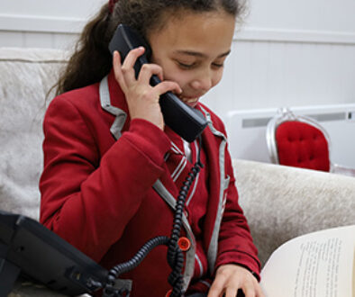 Student talking on the telephone.