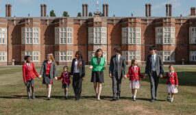 Headteacher Katherine Jeffrey standing at front of New Hall School
