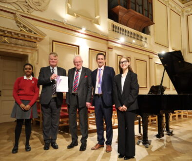 Staff with students of New Hall School