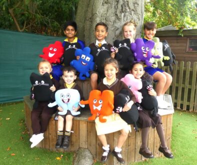 Photo of children holding Jigsaw puzzle pieces
